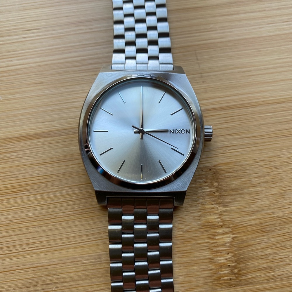 Nixon unisex all silver time teller Watch.